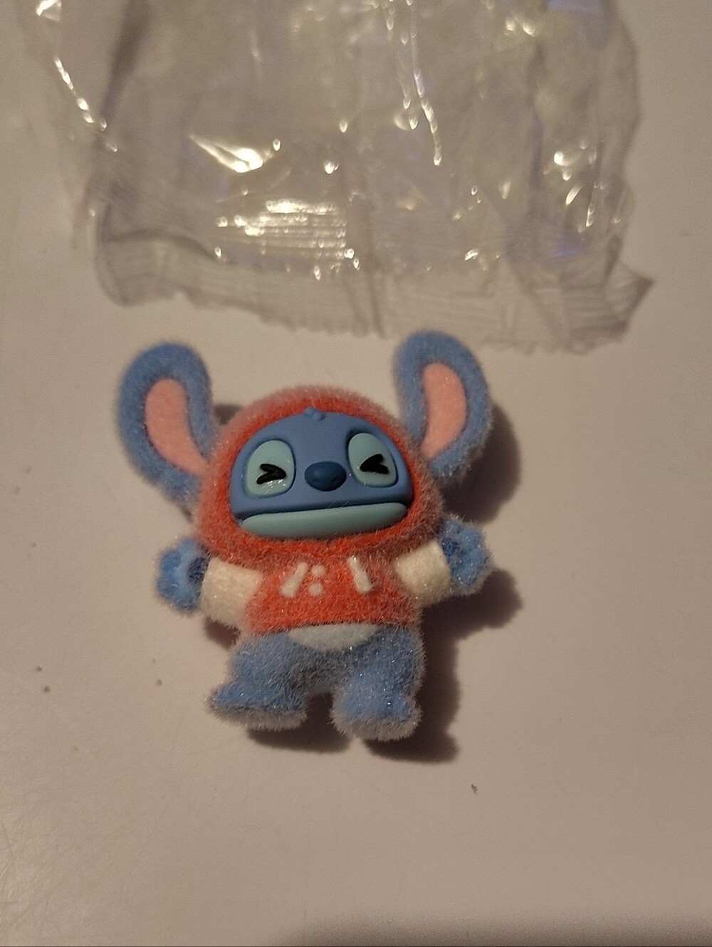 Stitch, Blue Fuzzy Cartoon Character Figurine in Red Hoodie